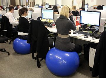 sitting-on-exercise-ball-at-work